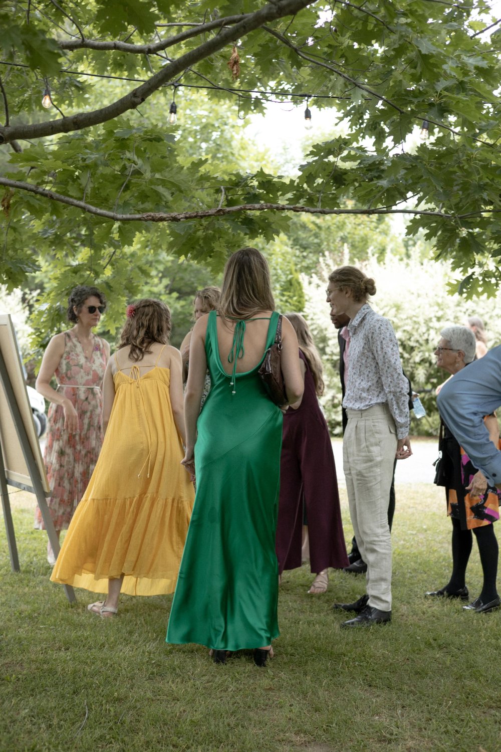Guests arriving to tree surrounded wedding reception at Niagara wedding