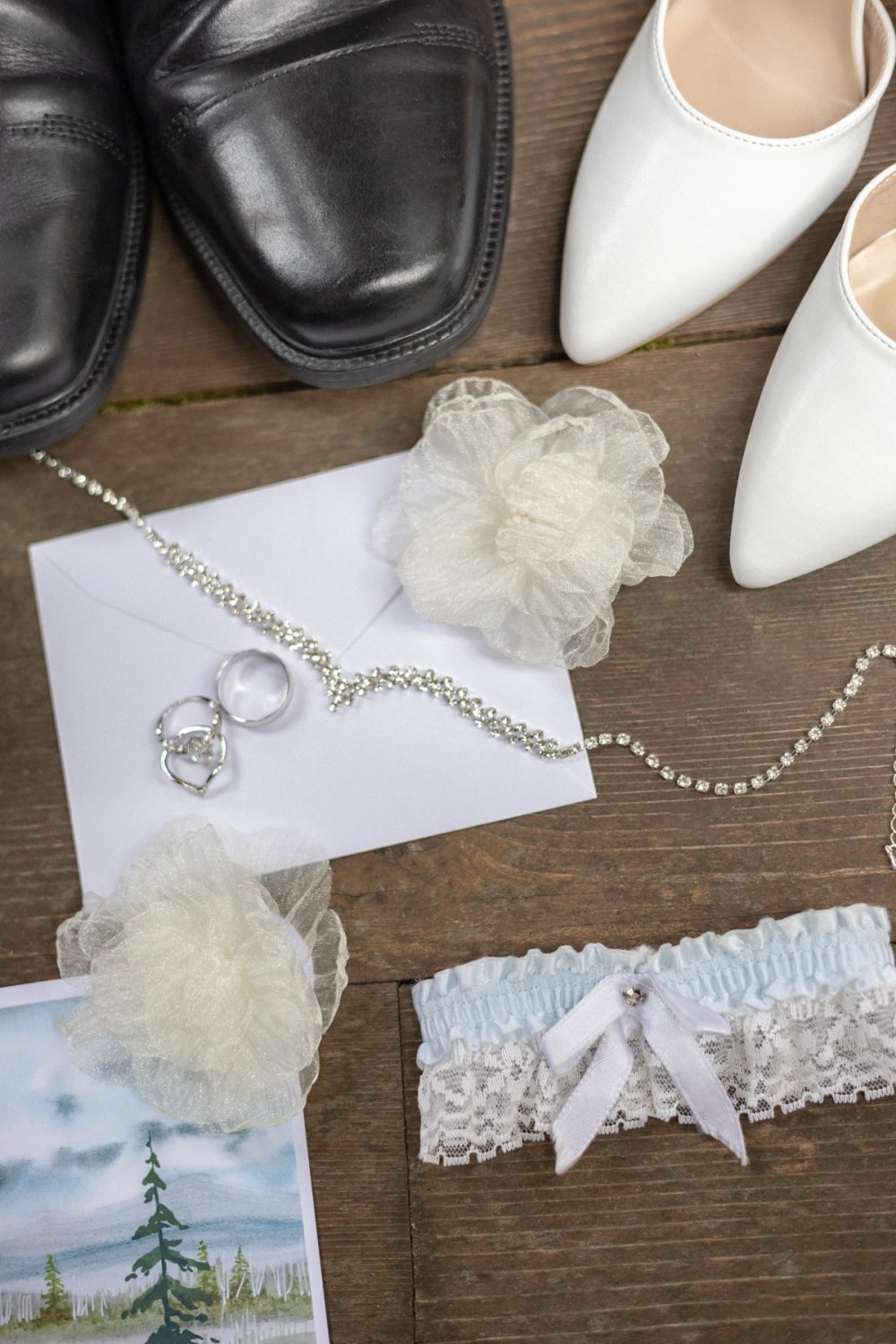 bride and groom's shoes, envelope with rings and necklace on top - Tobermory Elopement Photography