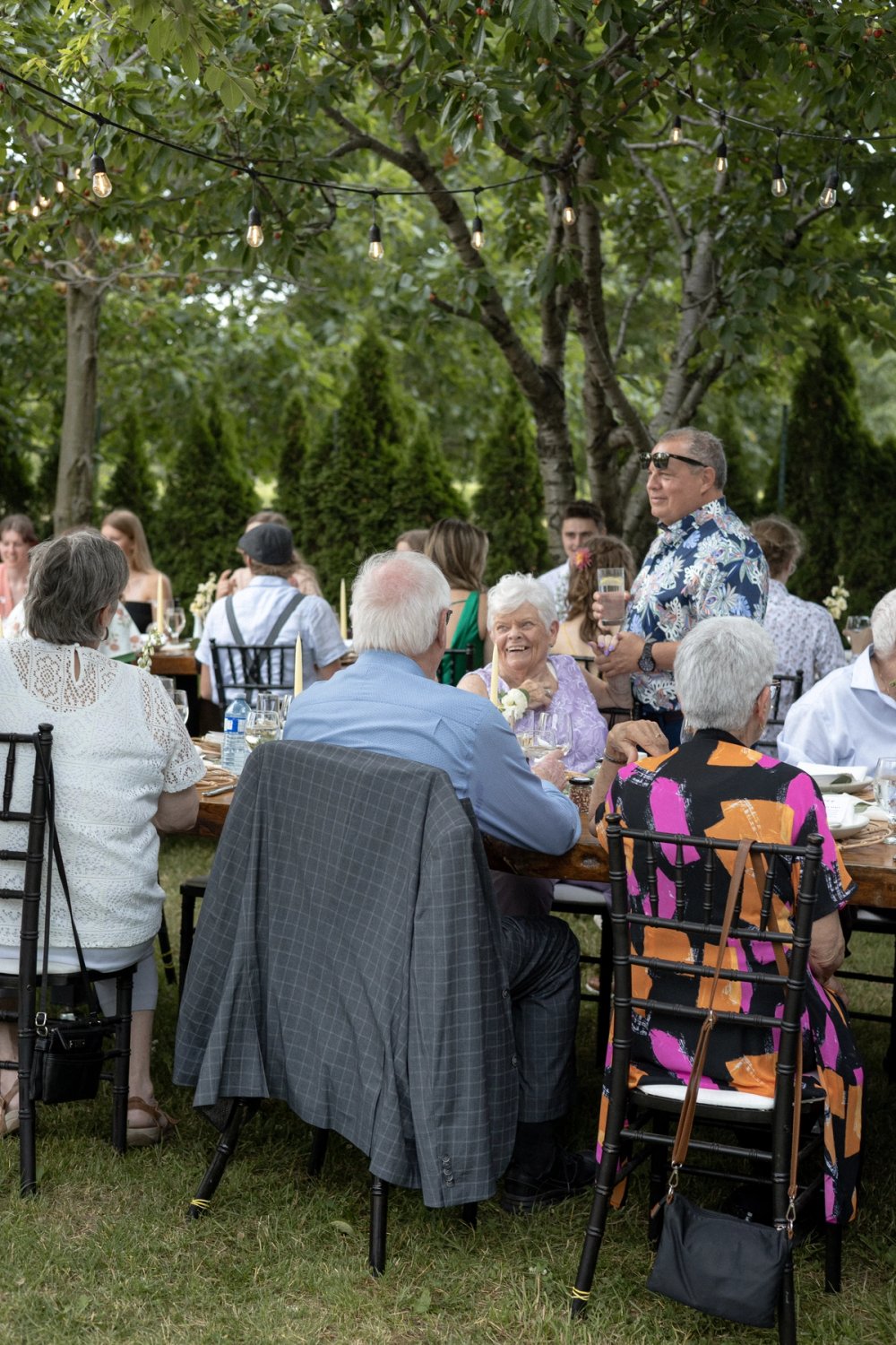 Wedding guests chatting during reception in Niagara
