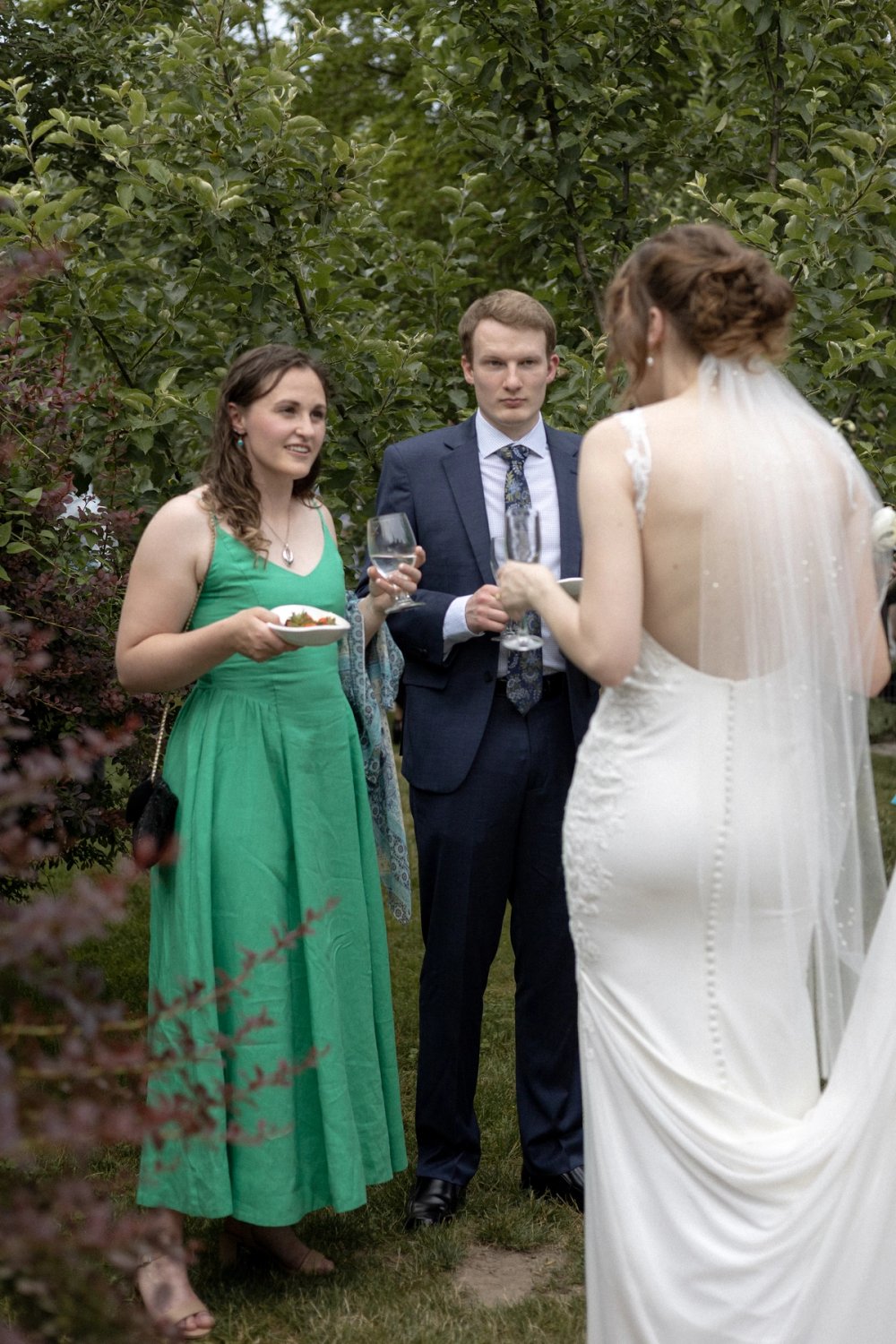 Bride interacting with guests during cocktail hour