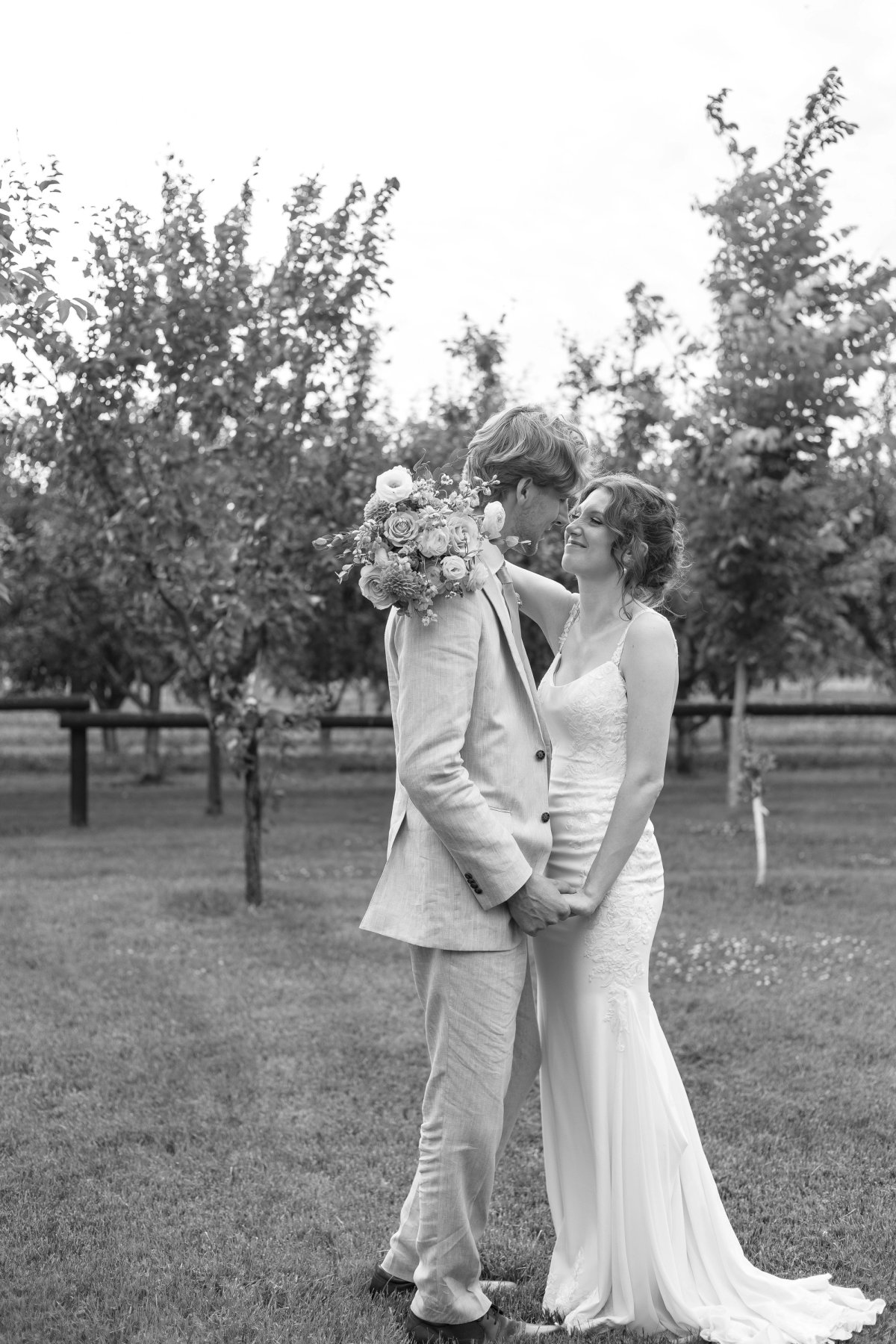 Documentary style wedding portraits near the orchard at Kurtz Orchards