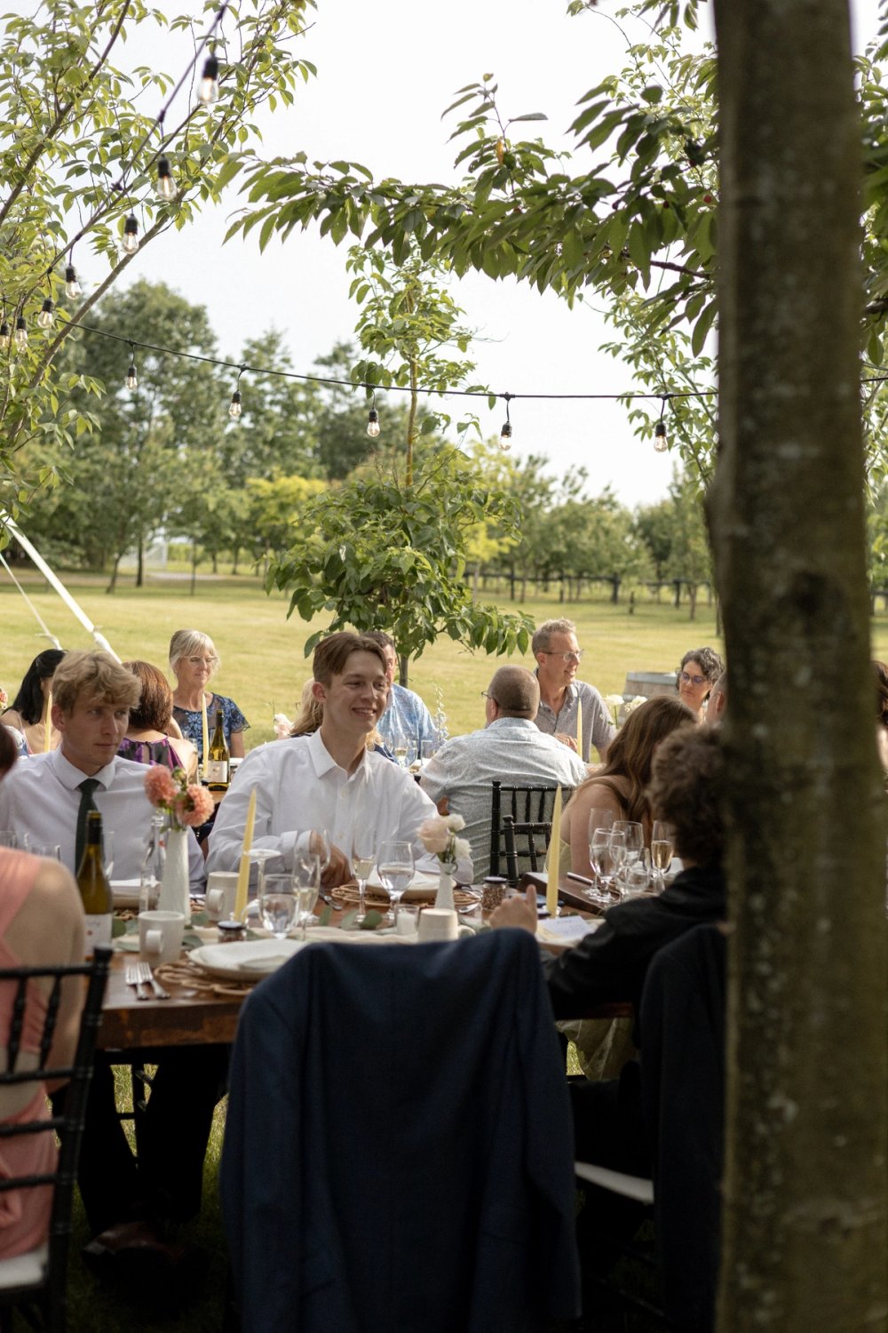 Guests sharing stories during wedding reception in Niagara