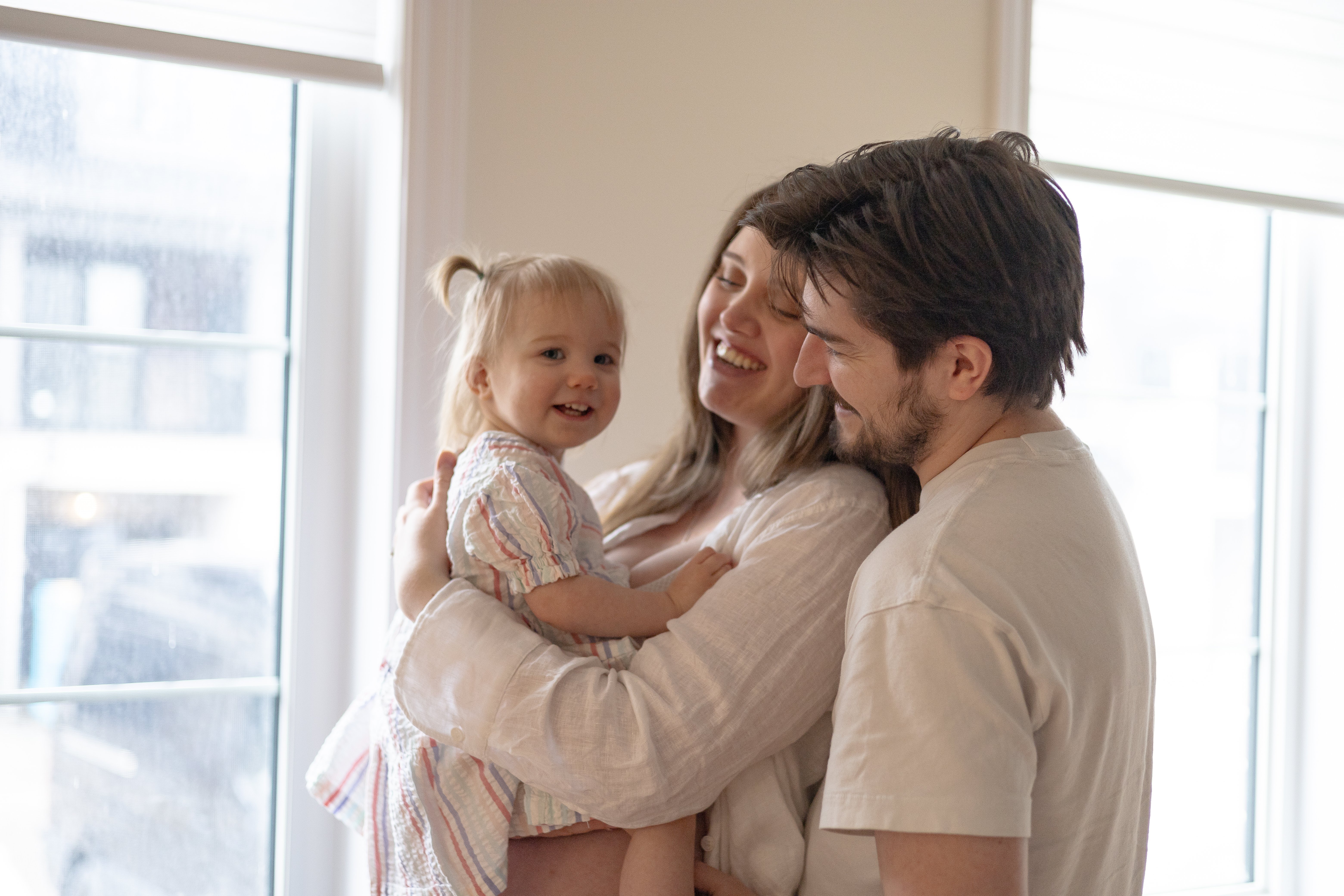 Close up image of family embracing - Newmarket Family Photographer