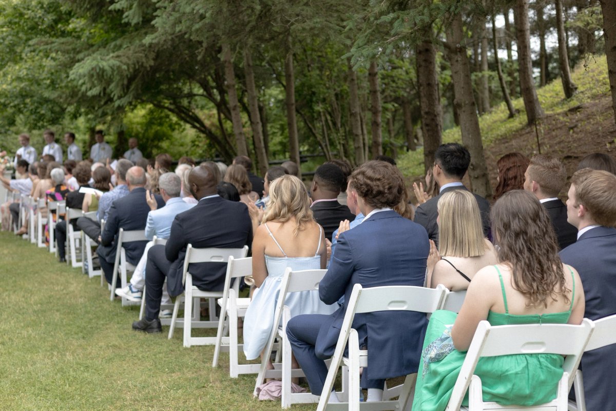 Guests sitting during outdoor ceremony for Kurtz Orchards wedding in Niagara