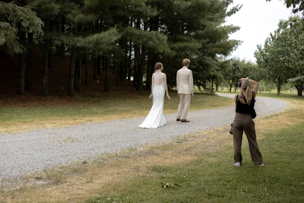 second photographer perspective during first look at Kurtz Orchard Niagara-on-the-Lake