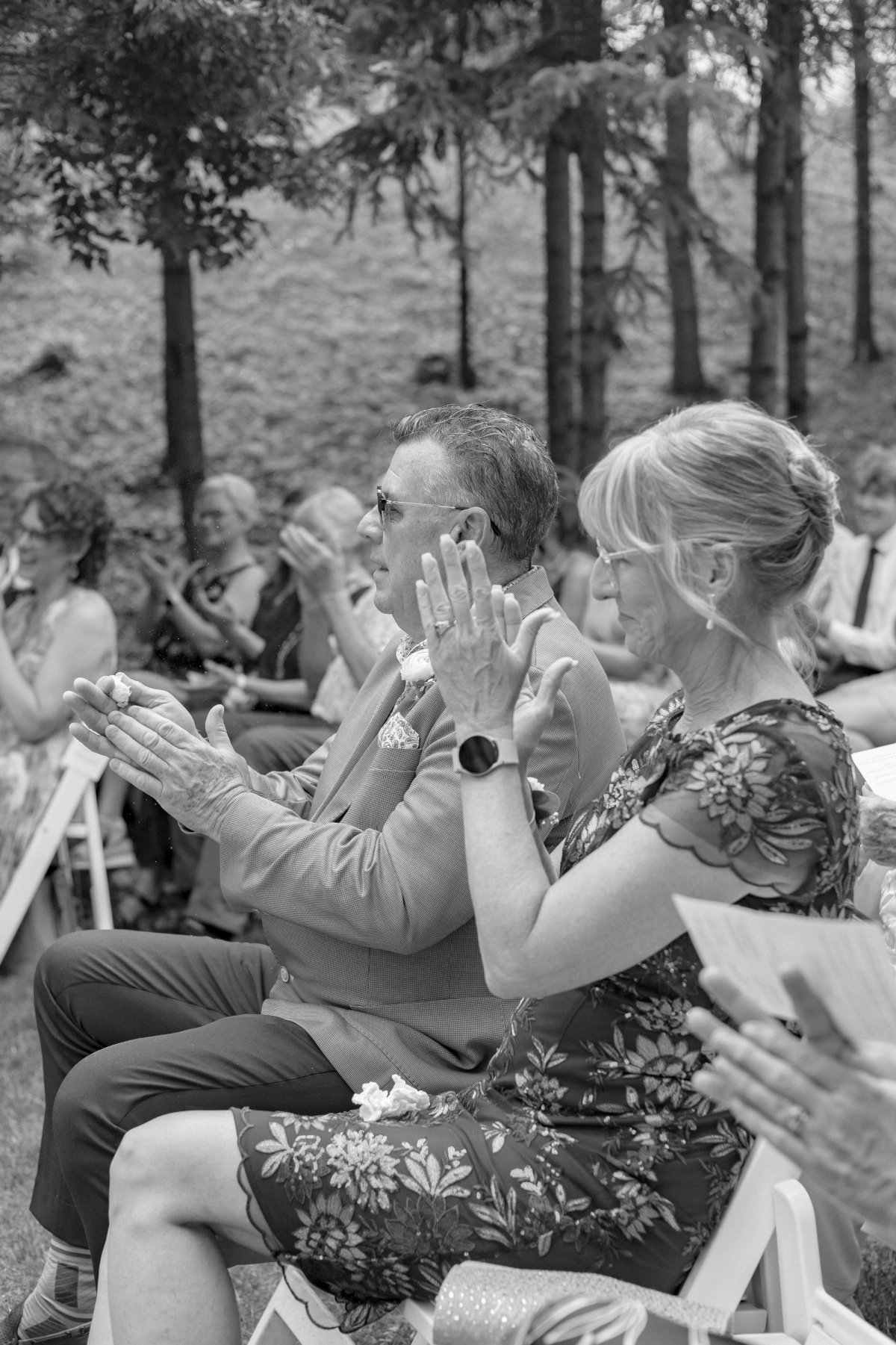Parents of bride watching ceremony at Kurtz Orchards wedding