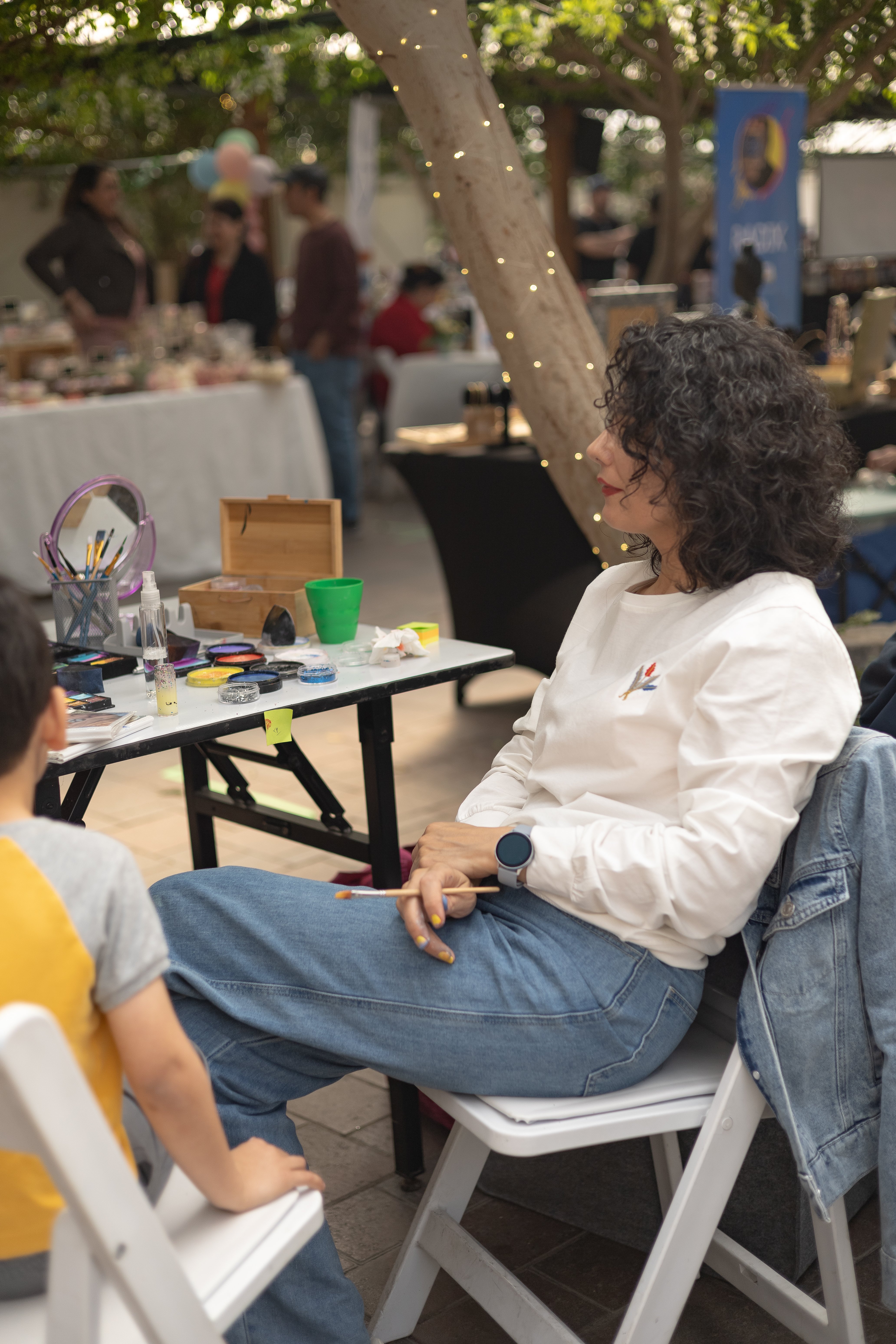 Face painter at local market in Newmarket, Ontario