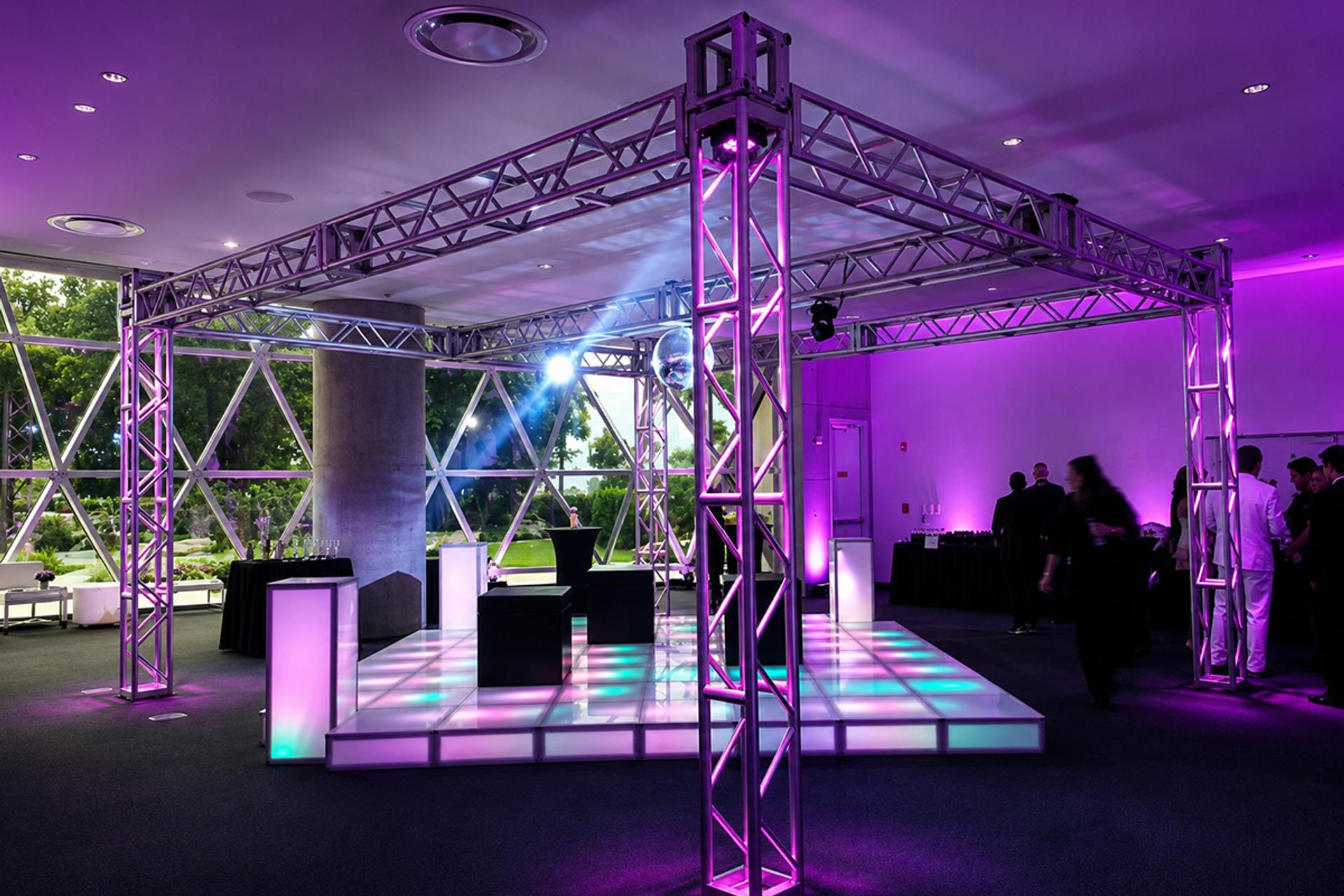 Stage and truss crew working on site