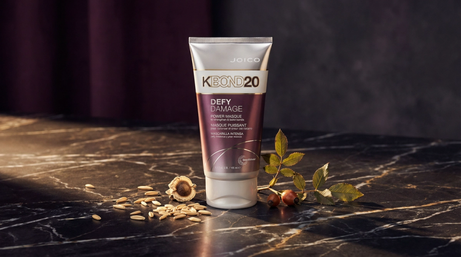 Joico KBOND20 Power Masque auf dunklem Marmor mit Hafer und Hagebutte – natürliche Wirkstoffe der Maske
