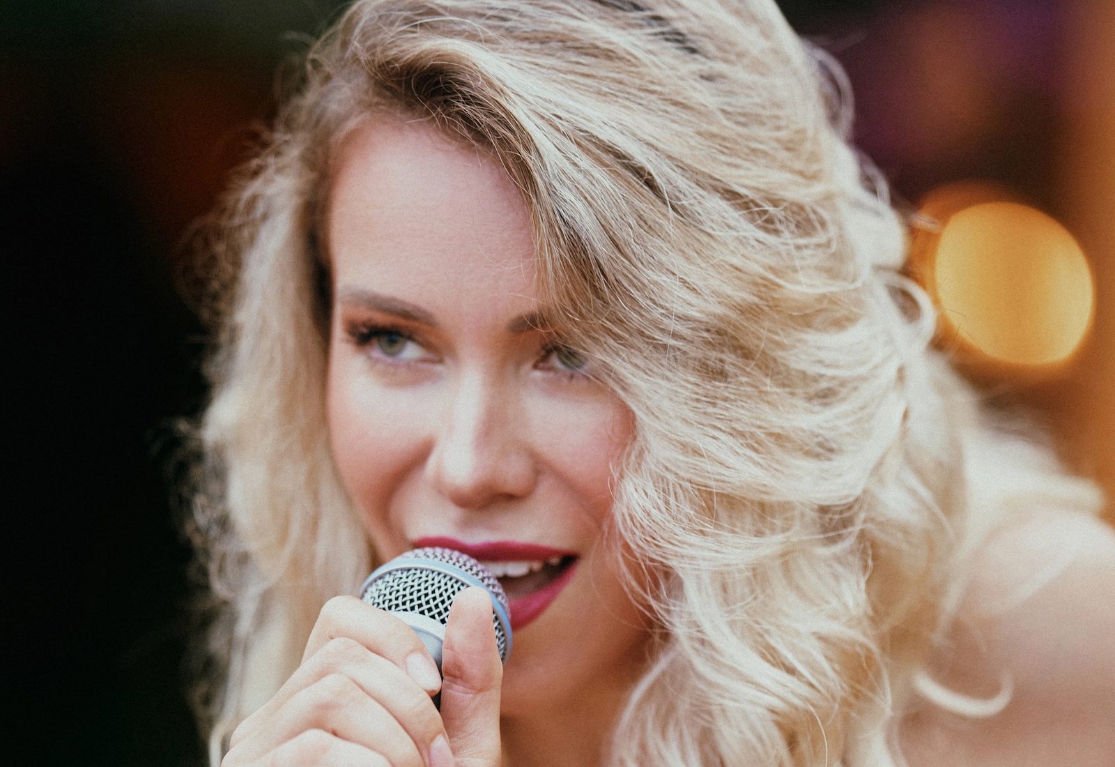 Close-up of a singer with a microphone