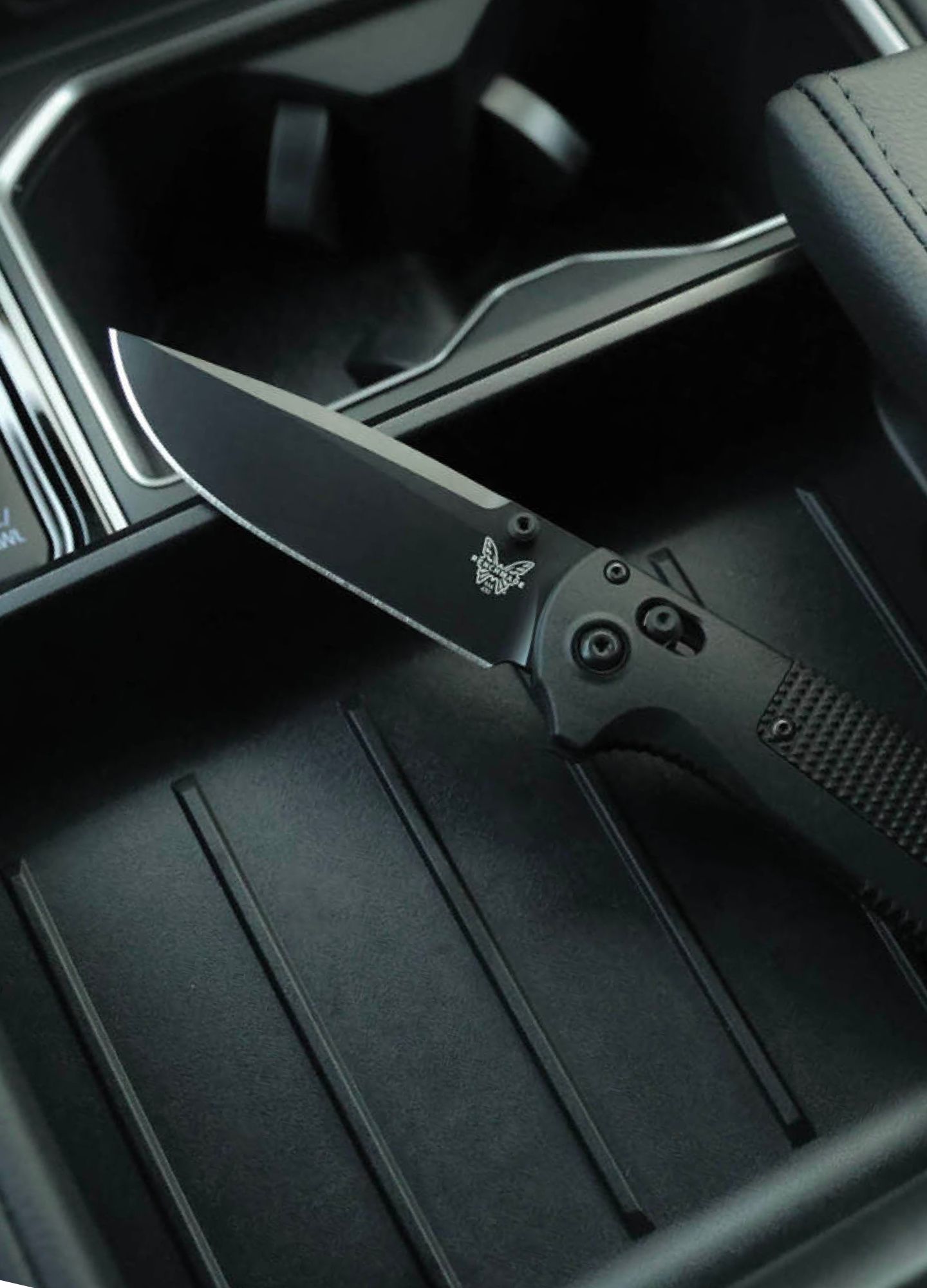 Benchmade knife sitting in car console