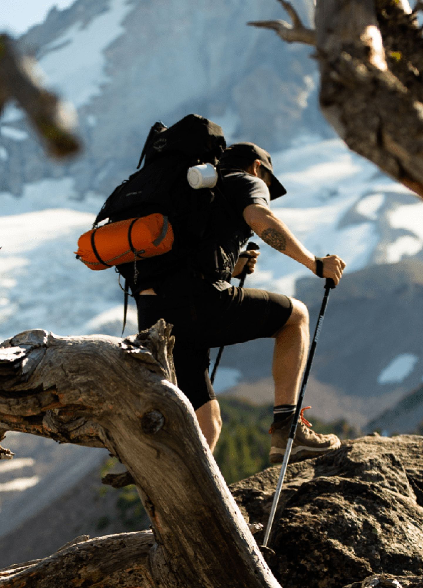 Hiker climbing mountain