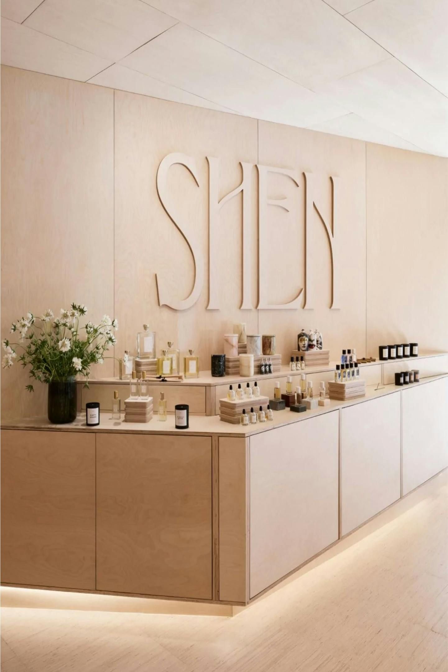 In-store photo of various Shen products, with the Shen logo on the wall