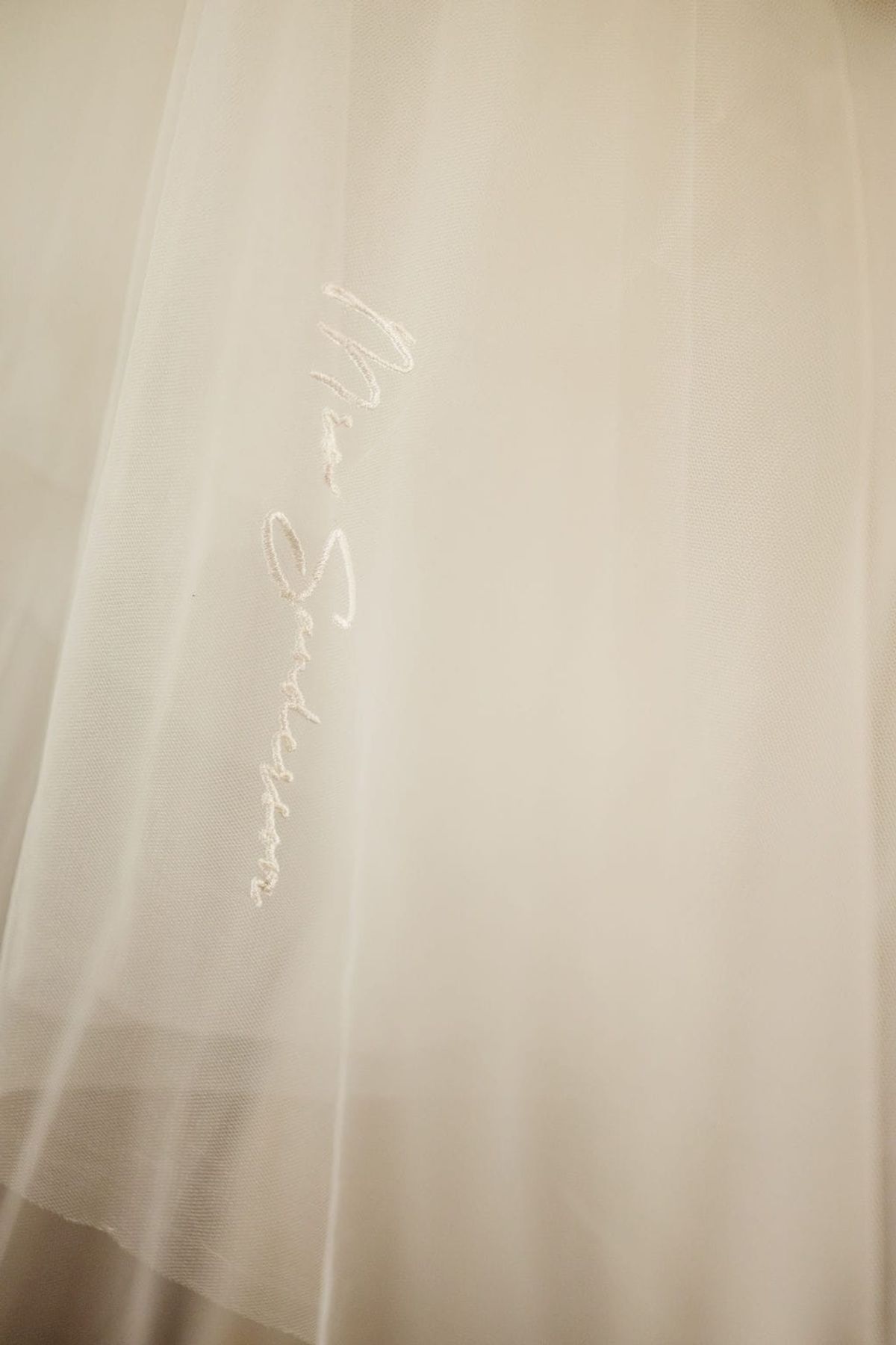 Delicate embroidered wedding veil detail