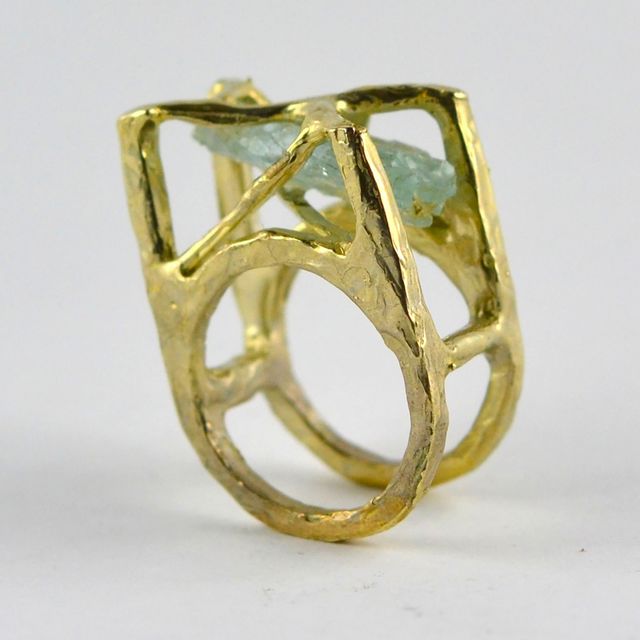 gold ring with blue stone