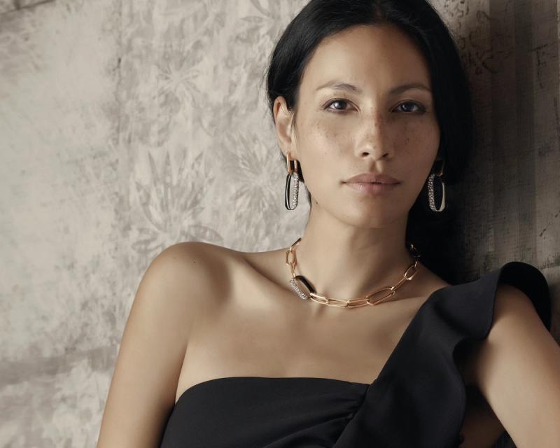 model with set of earrings and necklace