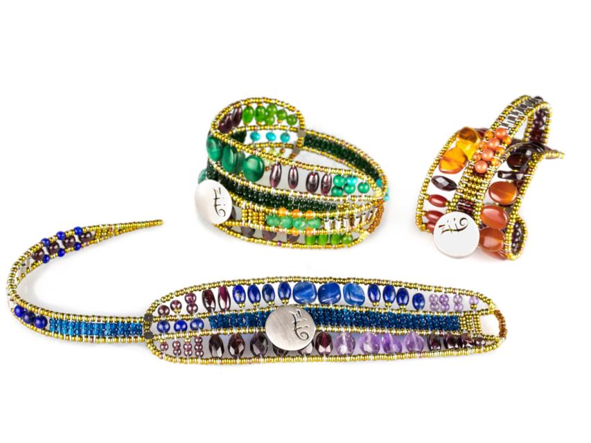 multicolored jewelry with green, blue and orange stones