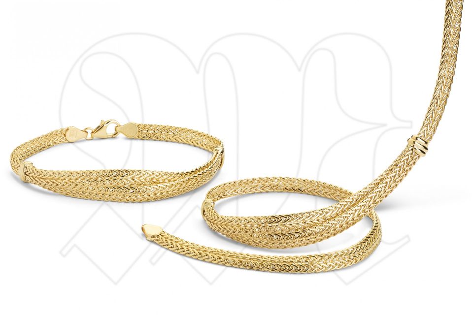 set of gold necklace and bracelet