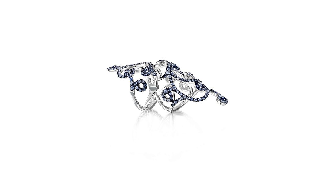 silver ring with blue stones and black details