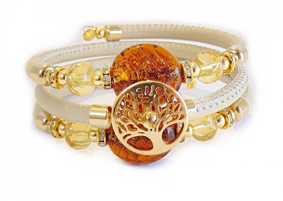 yellow bracelet with precious stones