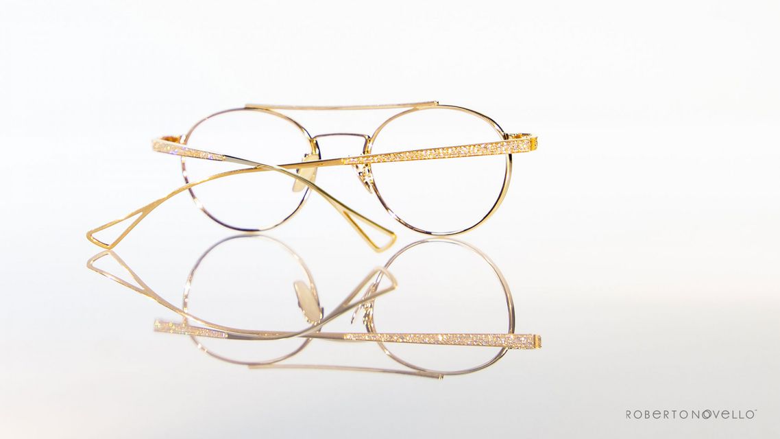 golden glasses with precious stones