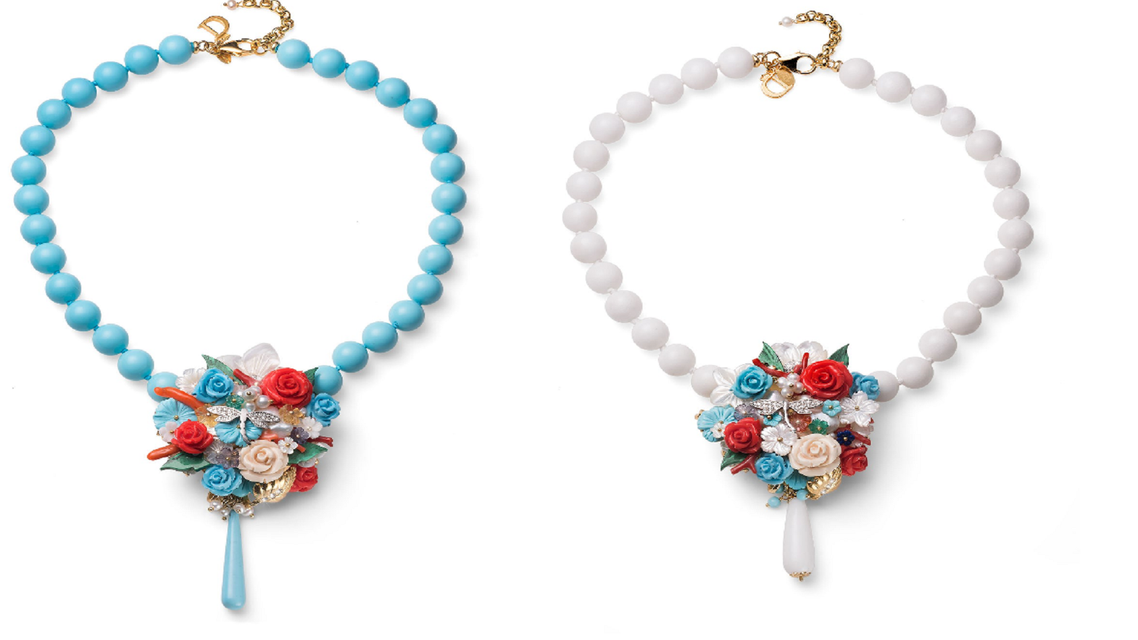 jewels with white and blue pearls and flower shaped details
