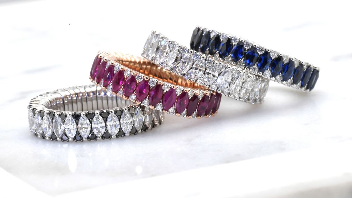 set of rings with colored precious stones
