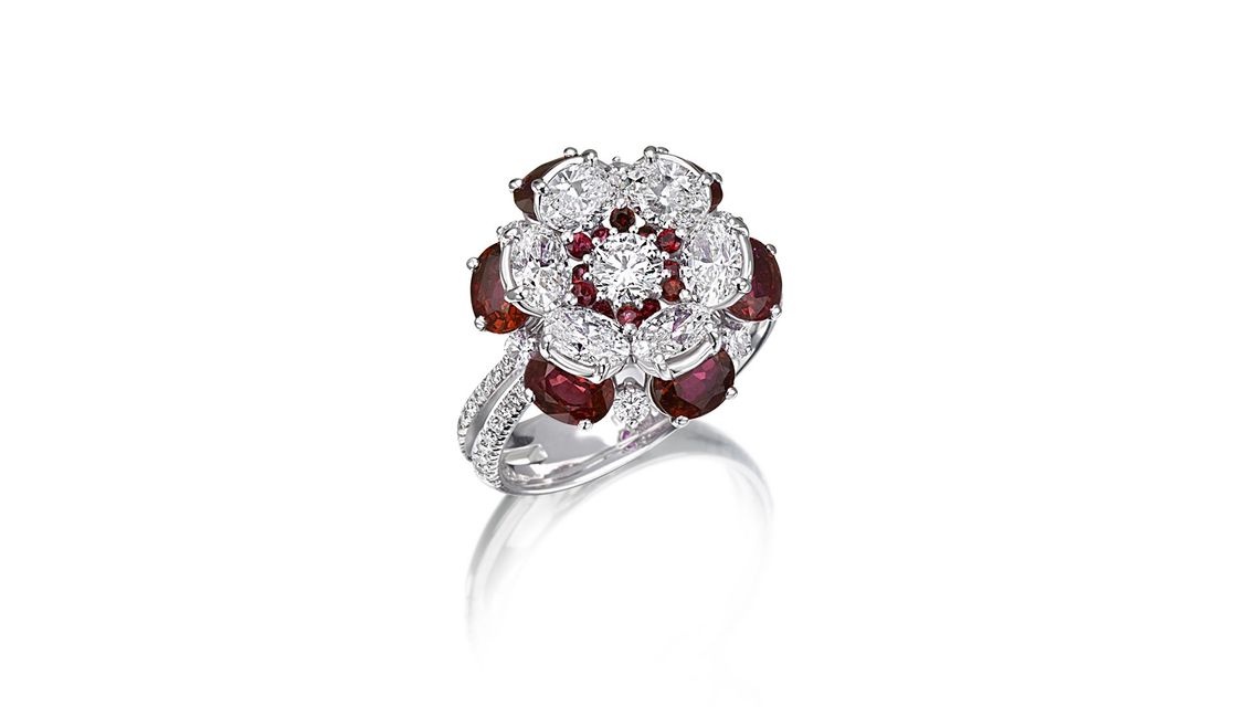 silver ring with precious stones