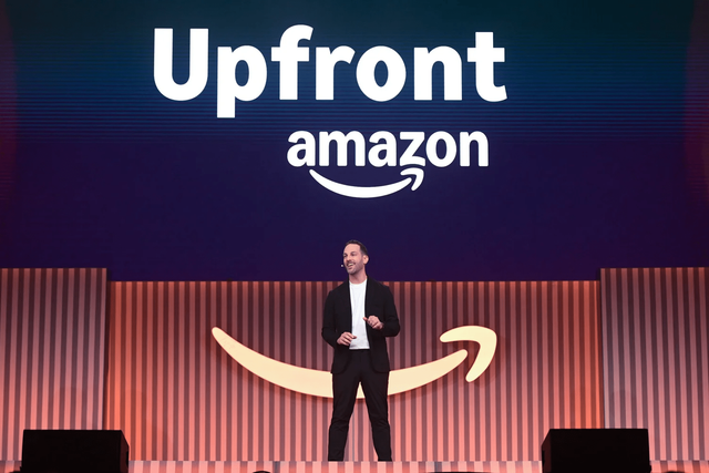 A speaker on stage at the Amazon Upfront keynote