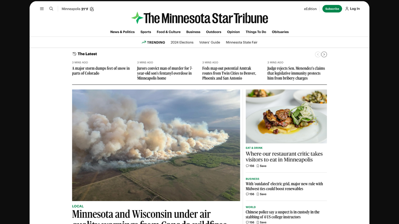 Desktop website homepage for the Minnesota Star Tribune showing headlines about local air quality warnings and restaurant reviews.