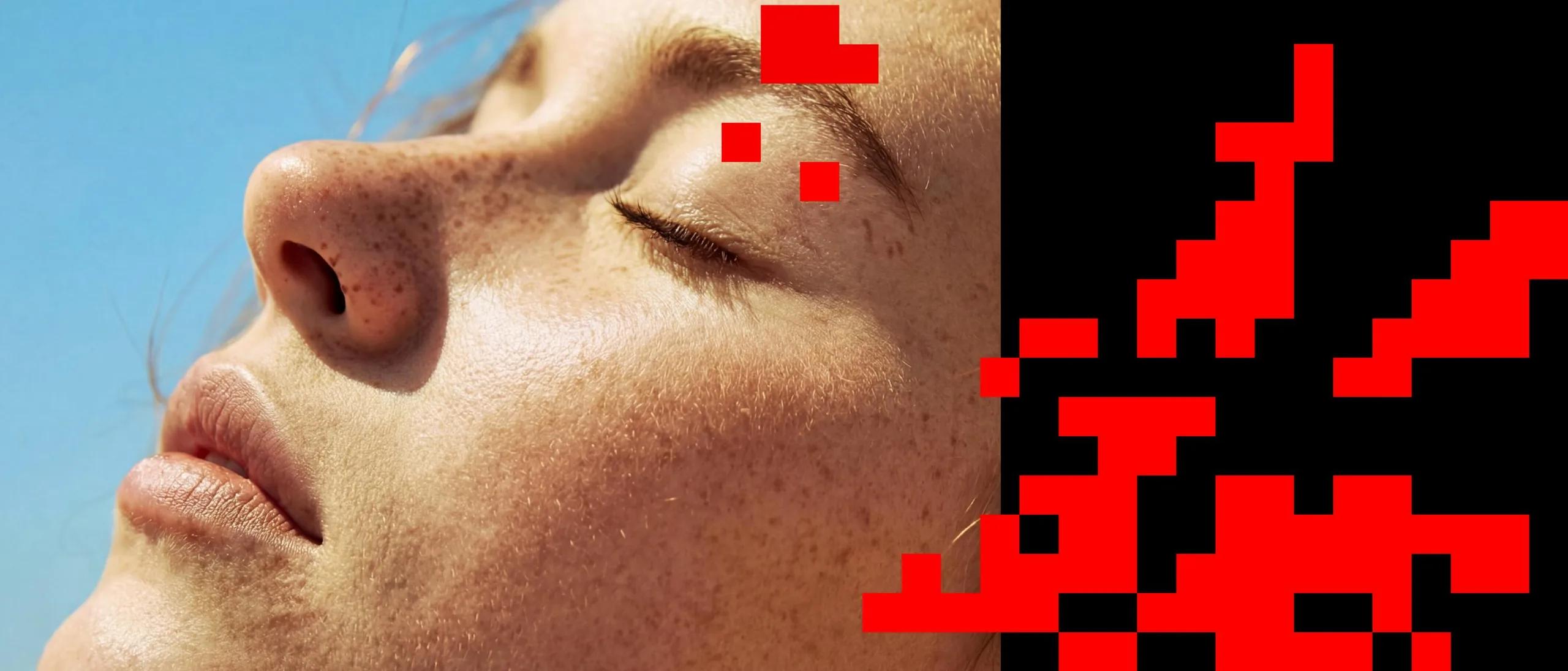 Close-up of a person's face with red pixelated overlay on the right side.