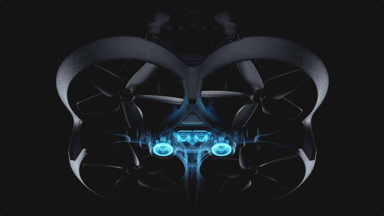 A drone viewed from below, featuring glowing blue lights and four propellers, set against a dark background.