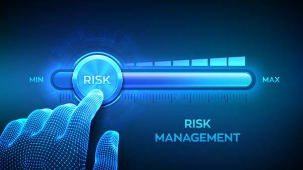 Graphic of a hand sliding risk from high to low with the words "risk management"