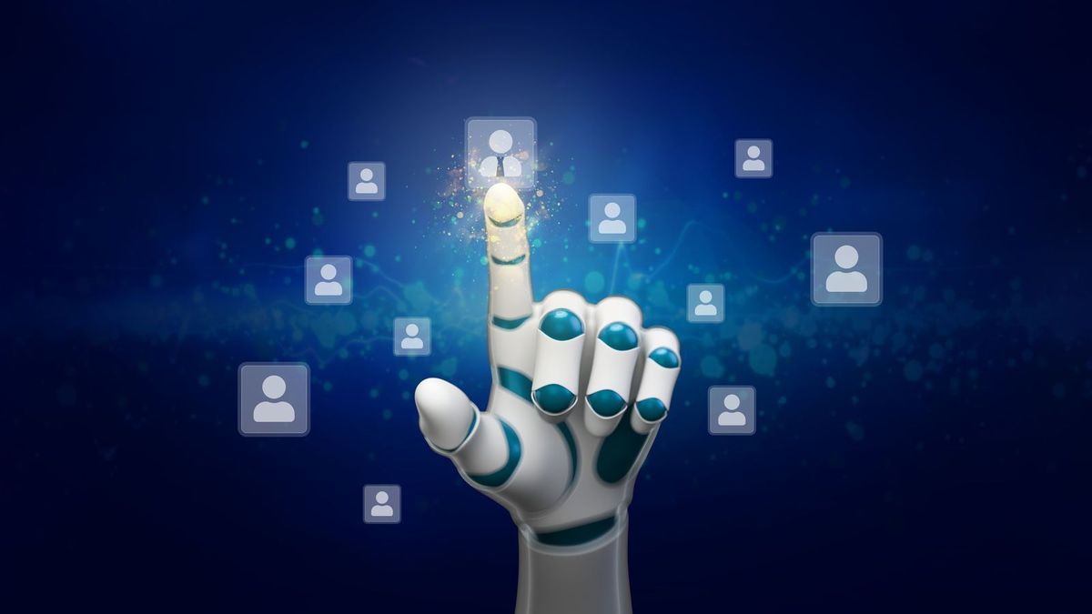 Robotic hand selecting an icon of a person