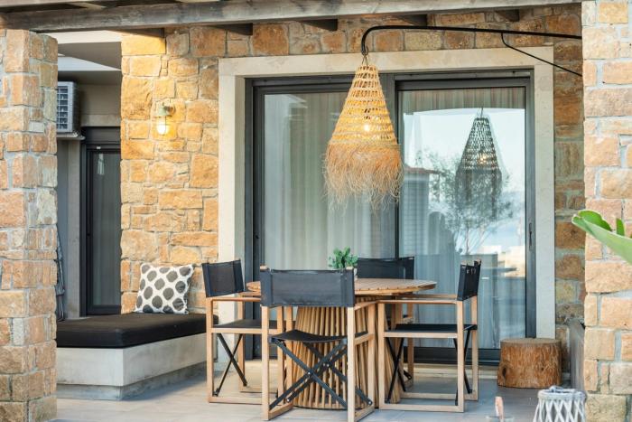 Outdoor dining with woven pendant light