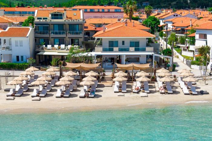 Resort beachfront with umbrellas and sea views