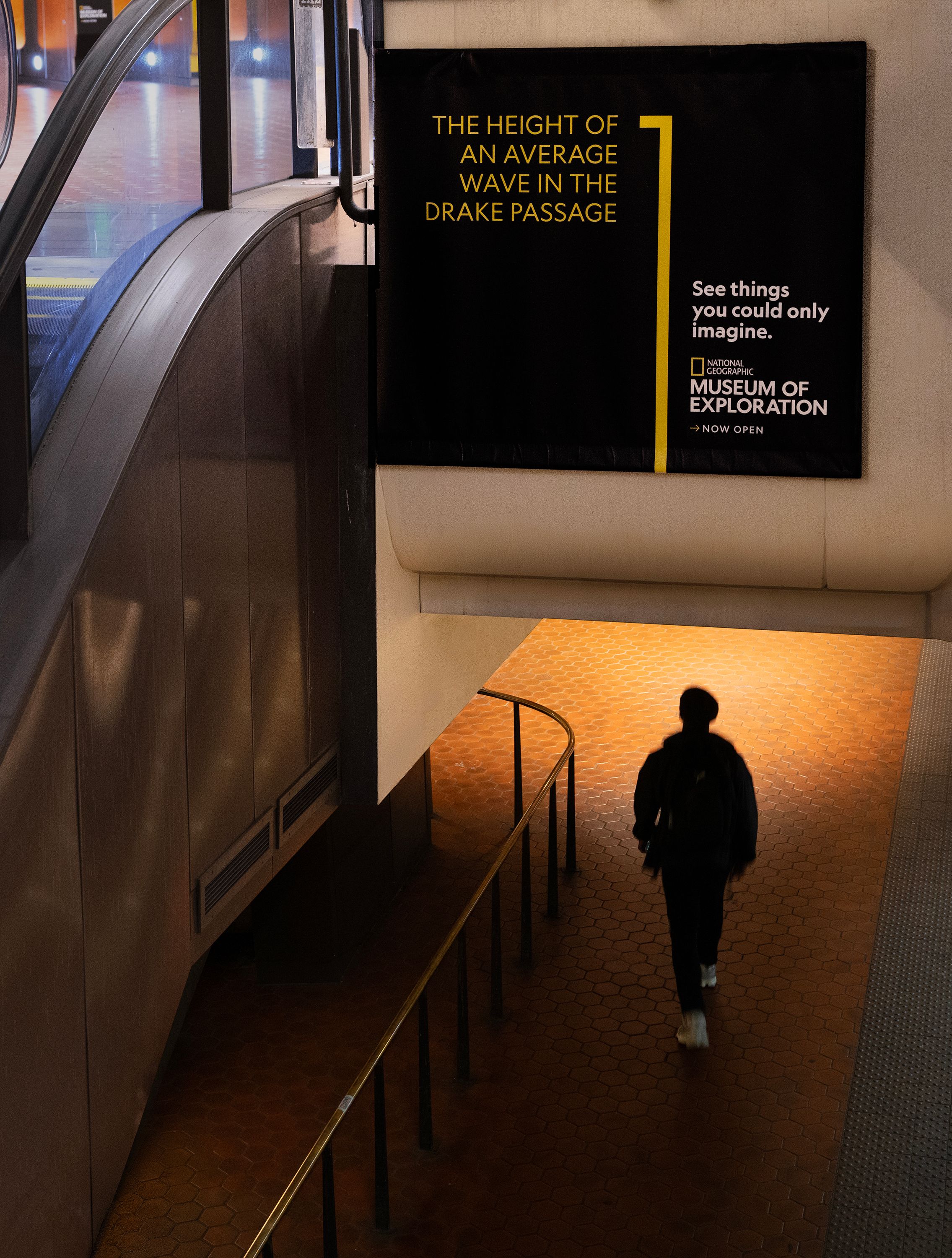 National Geographic Museum of Exploration ad comparing the height of an average wave in the Drake Passage to a person.