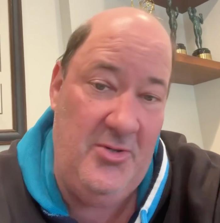 Brian Baumgartner speaking directly to the camera in a video recorded for a creative campaign.
