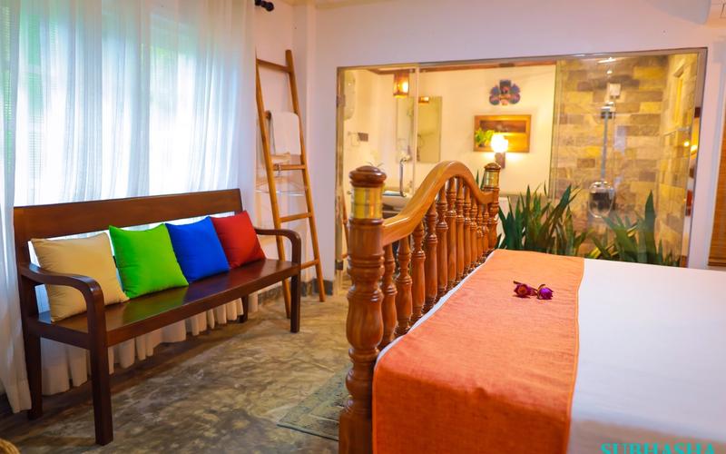 A cozy, light-filled room designed for comfort and relaxation — where tropical charm meets modern warmth.