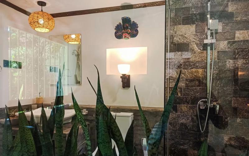 Spacious second bathroom with bath, hot water shower and bidet.