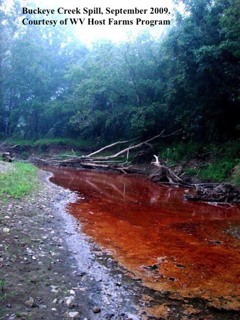 a river is now red with pollution after a chemical spill caused by fracking