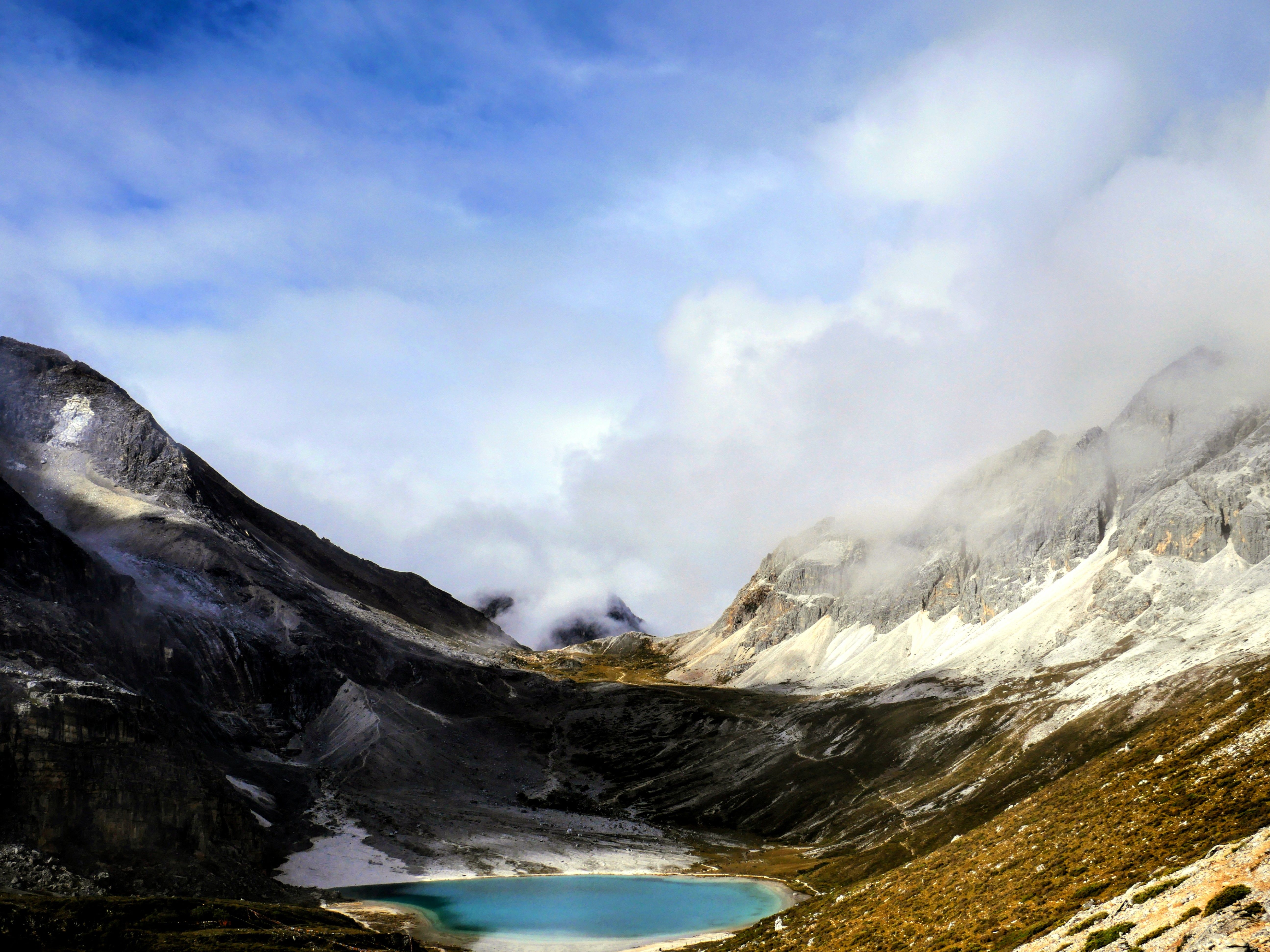 Milk Lake (Niunai Hai) below the snow peaks in Daocheng Yading Nature Reserve, Sichuan