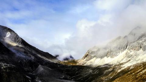 Milk Lake (Niunai Hai) below the snow peaks in Daocheng Yading Nature Reserve, Sichuan