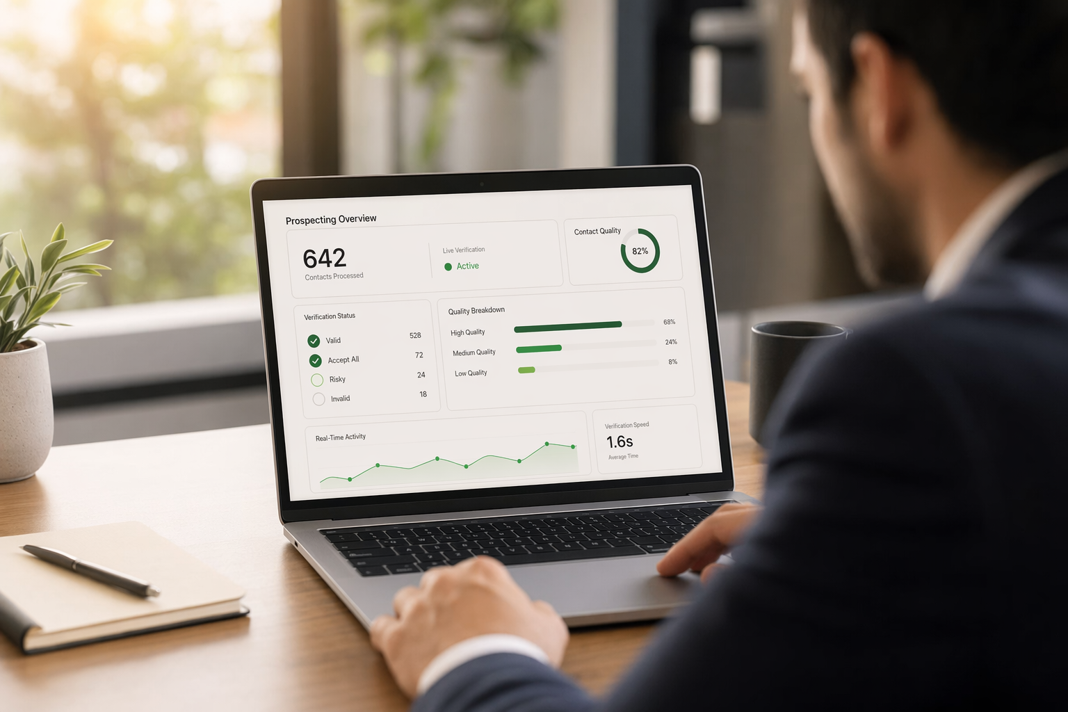 Sales professional reviewing verified contact data from LinkedIn prospecting tools on laptop