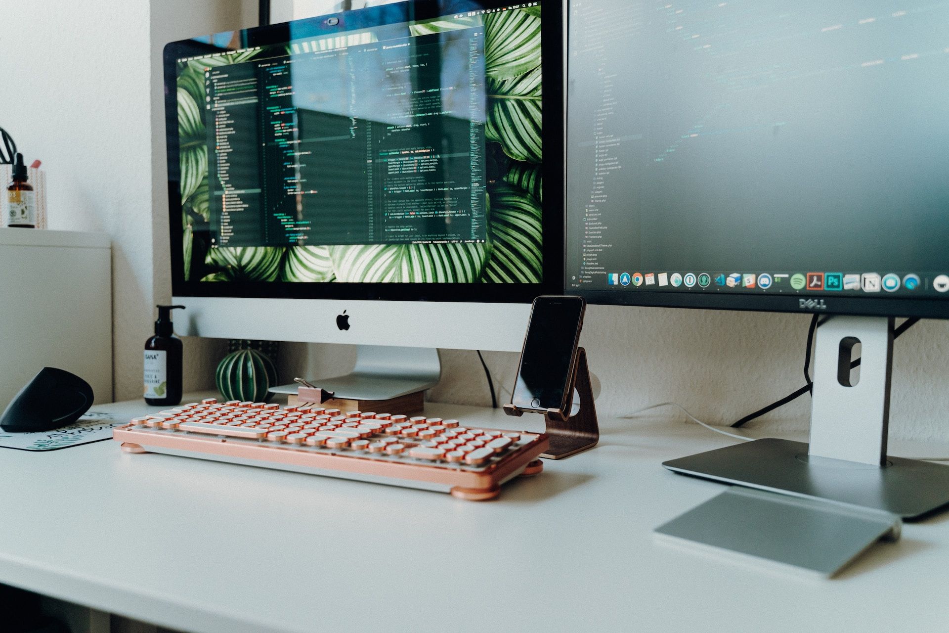 Desk with monitors and keyboard