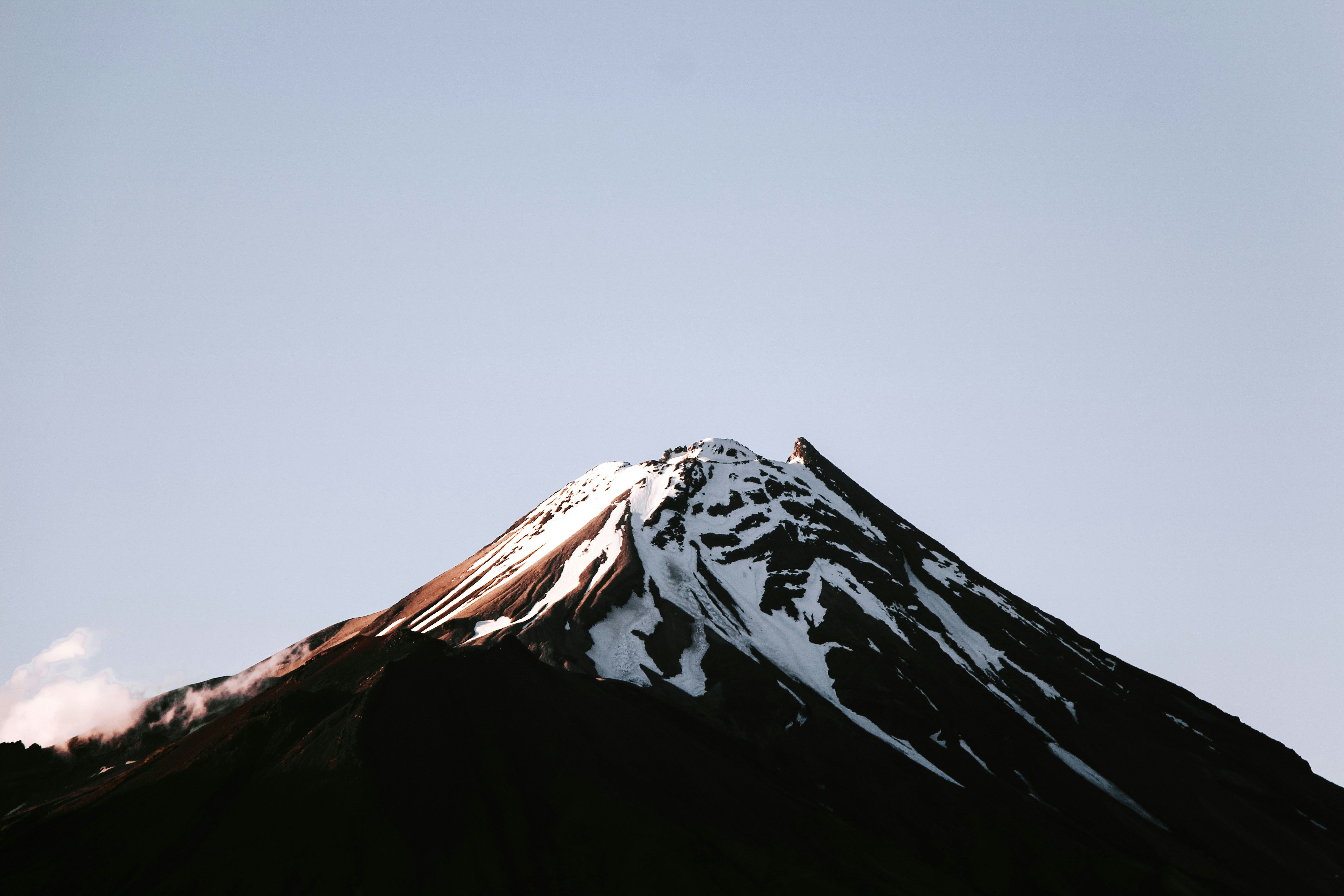 Mount Taranaki, New Zealand. Taken by Tyler Lastovich and published on Unsplash.