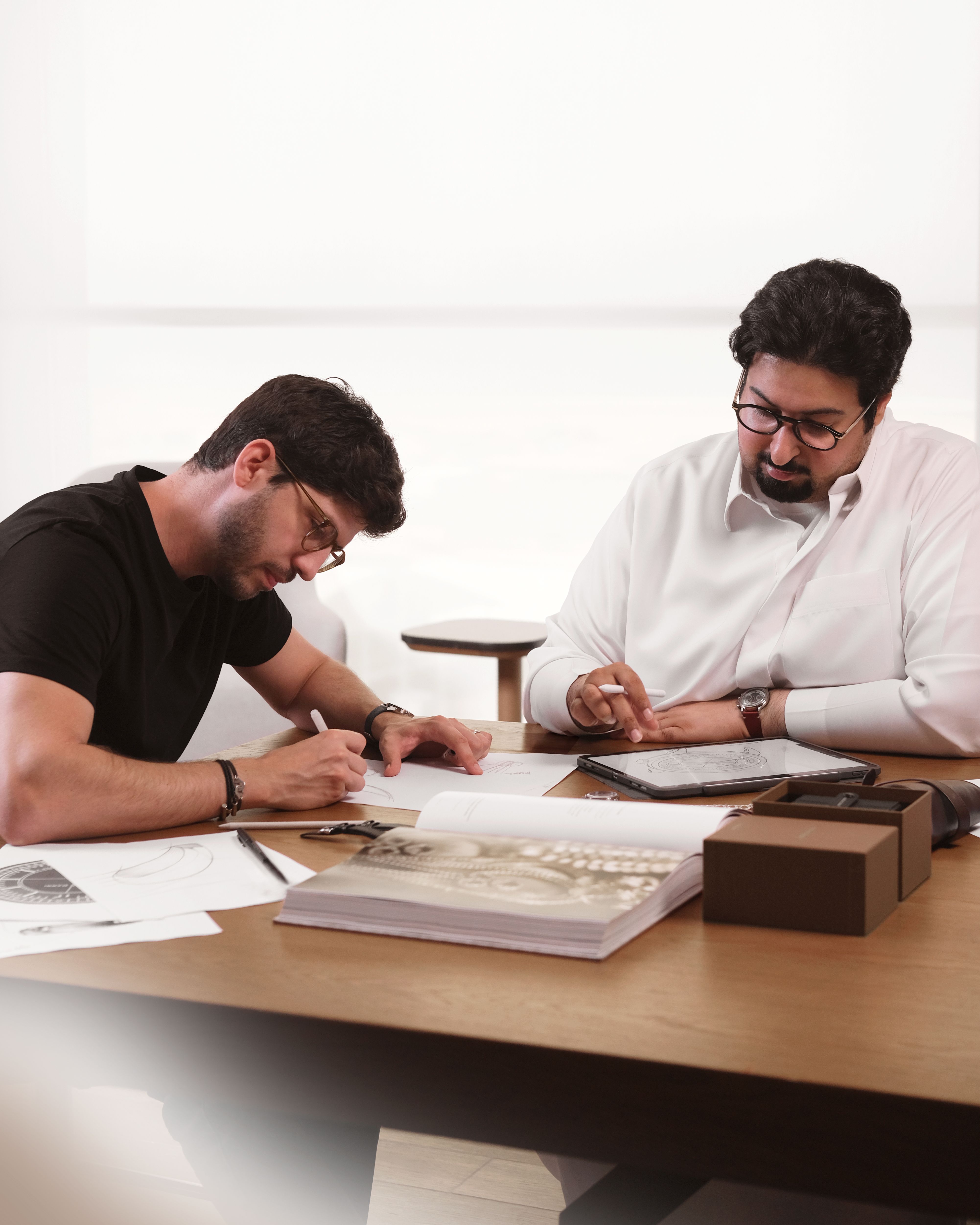 Andrea Furlan and Hamad Al Marri sketching