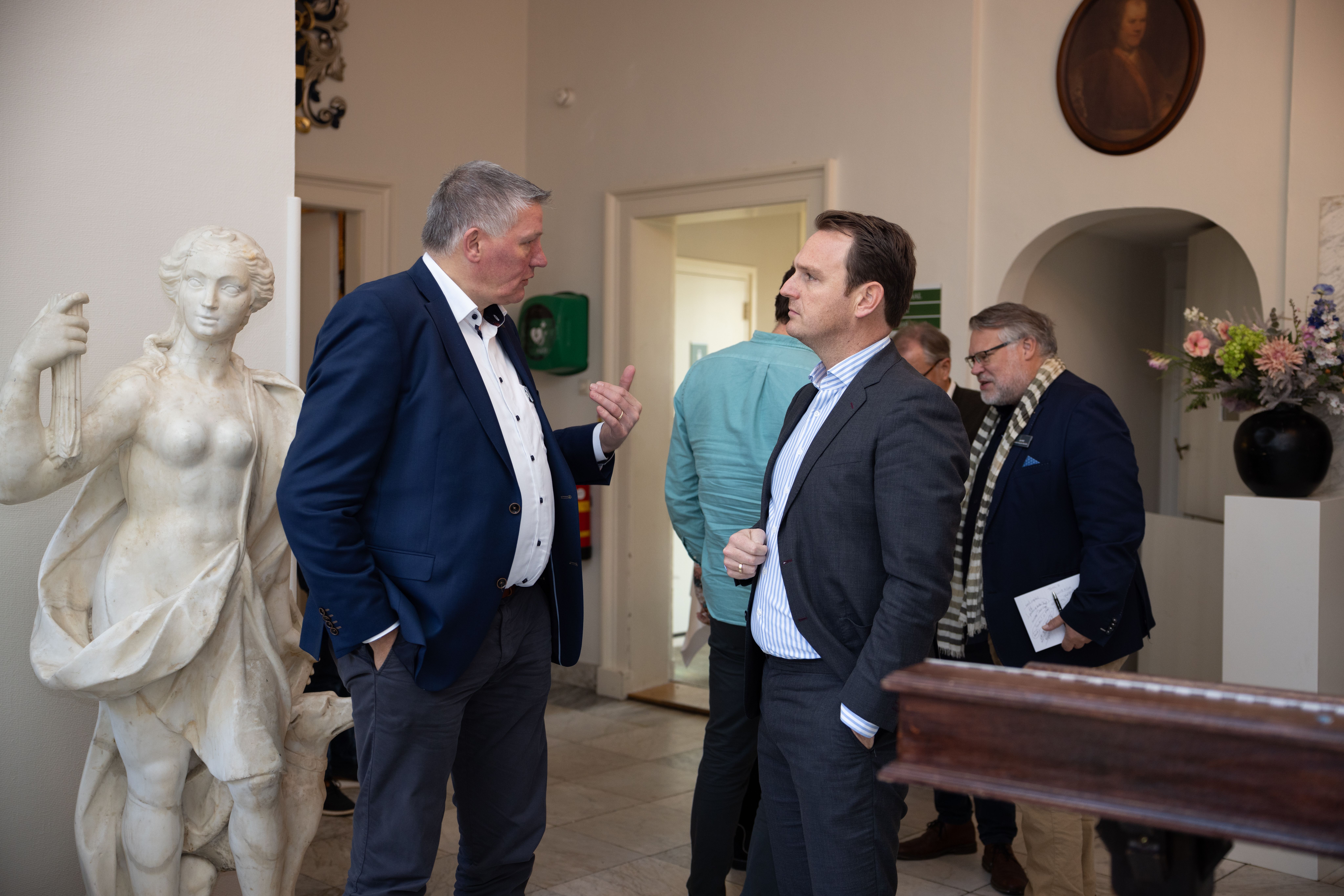 Two programme participants in conversation during a Board Mastery session