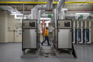 Man walking through utility room