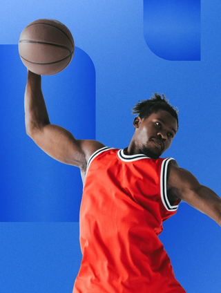 man jumping with basketball